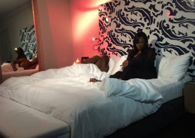 Sabine Francoeur & Male Model in bed during video shoot of Mwen Bezwen
